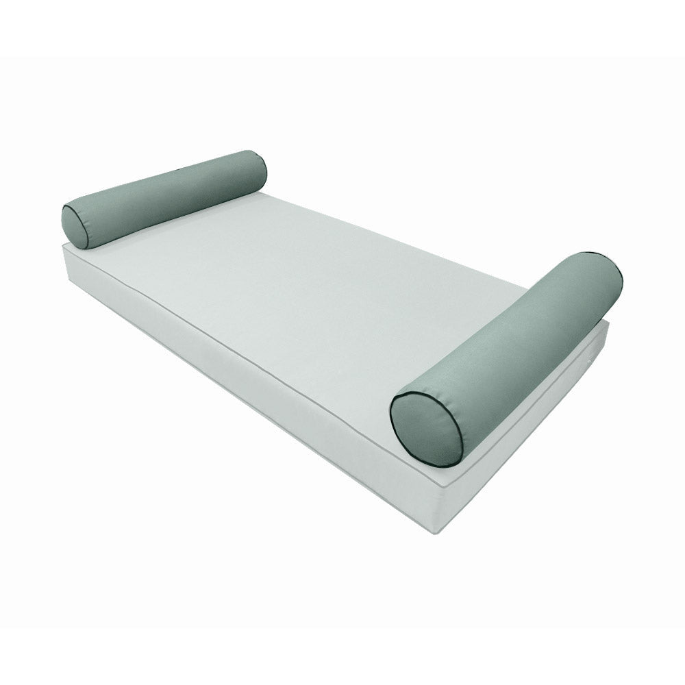 Elegant cushion and bolster set featuring refined craftsmanship and knife-edge detailing, designed for versatile indoor and outdoor comfort.