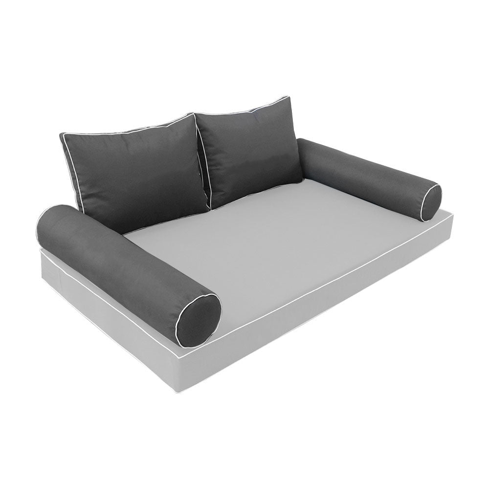 Elegant cushion and bolster set featuring refined craftsmanship and knife-edge detailing, designed for versatile indoor and outdoor comfort.
