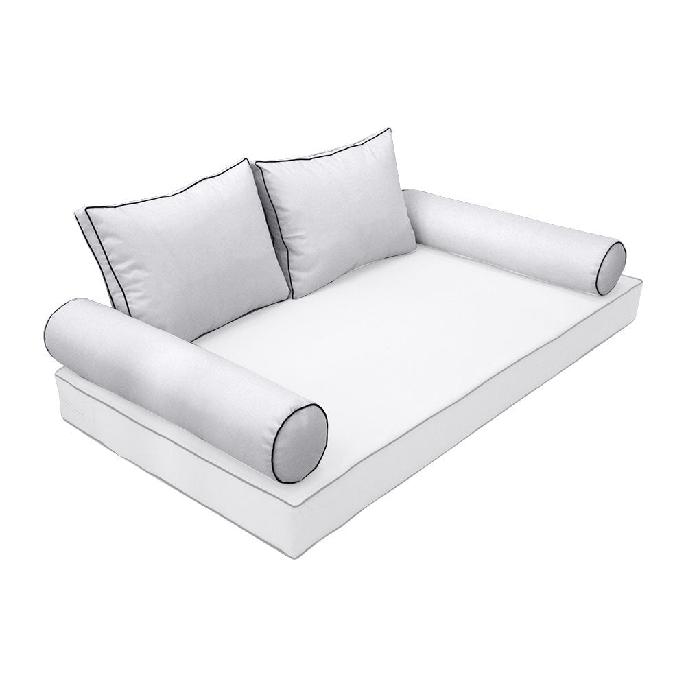 Elegant cushion and bolster set featuring refined craftsmanship and knife-edge detailing, designed for versatile indoor and outdoor comfort.