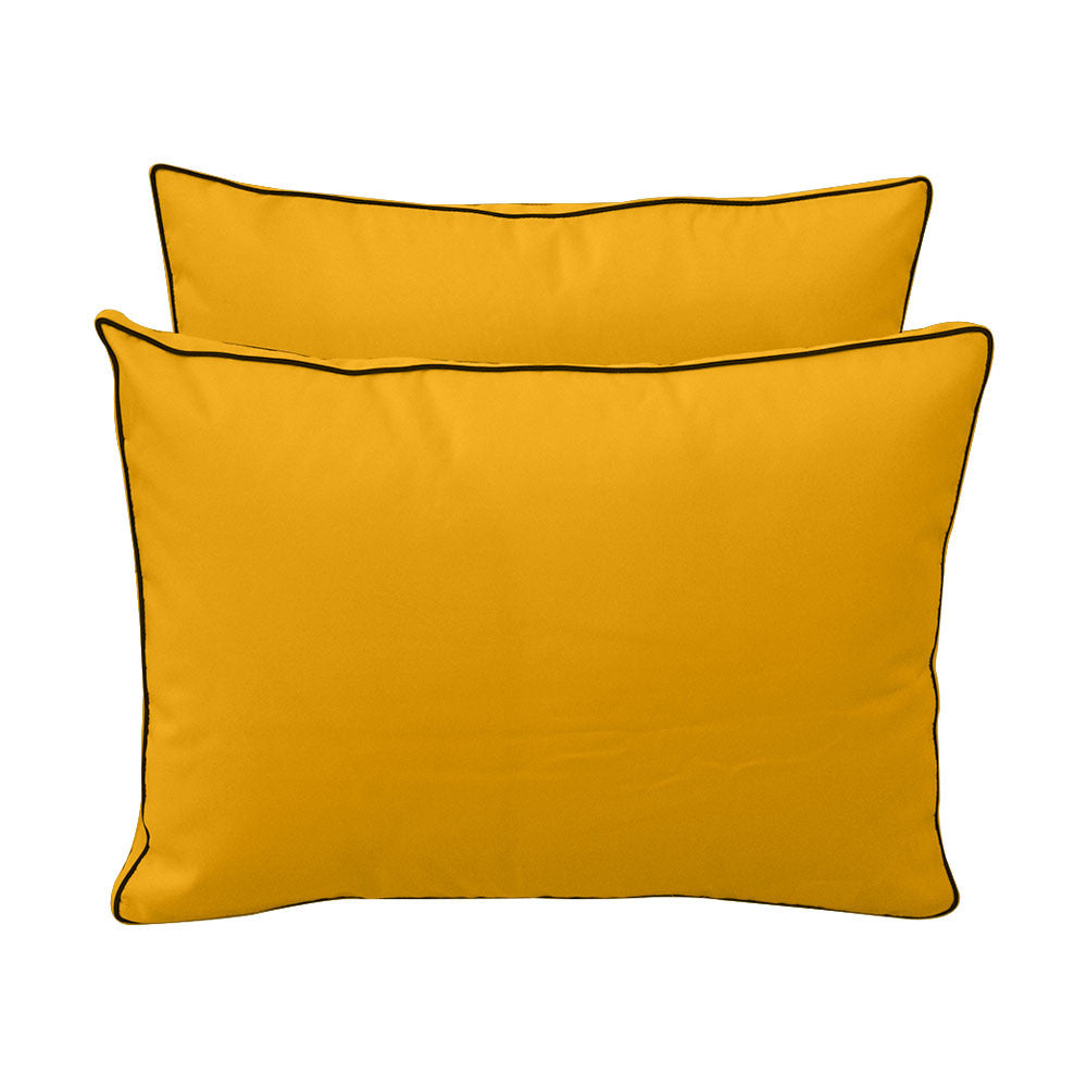 Pillow and bolster cushions displayed on an outdoor porch swing for a cozy, elegant setting.