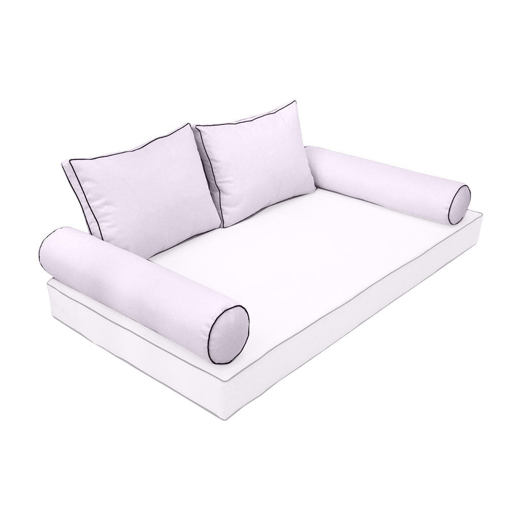 Elegant cushion and bolster set featuring refined craftsmanship and knife-edge detailing, designed for versatile indoor and outdoor comfort.