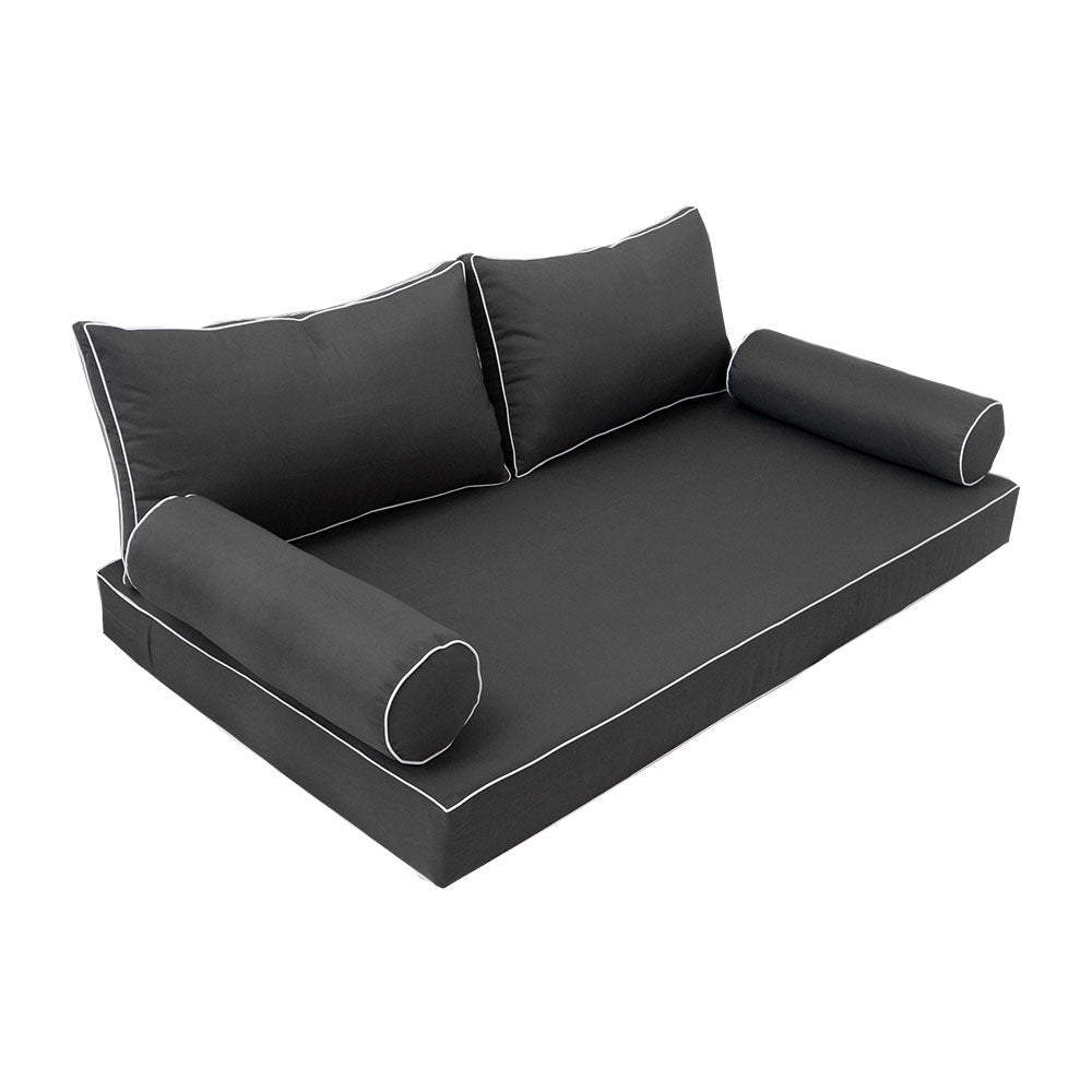 Elegant cushion and bolster set featuring refined craftsmanship and knife-edge detailing, designed for versatile indoor and outdoor comfort.