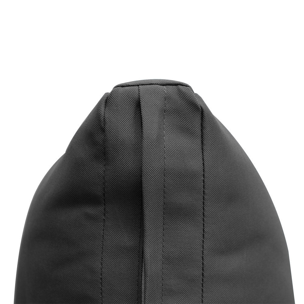 Indoor sunroom with pillow and bolster cushions, adding warmth and modern comfort