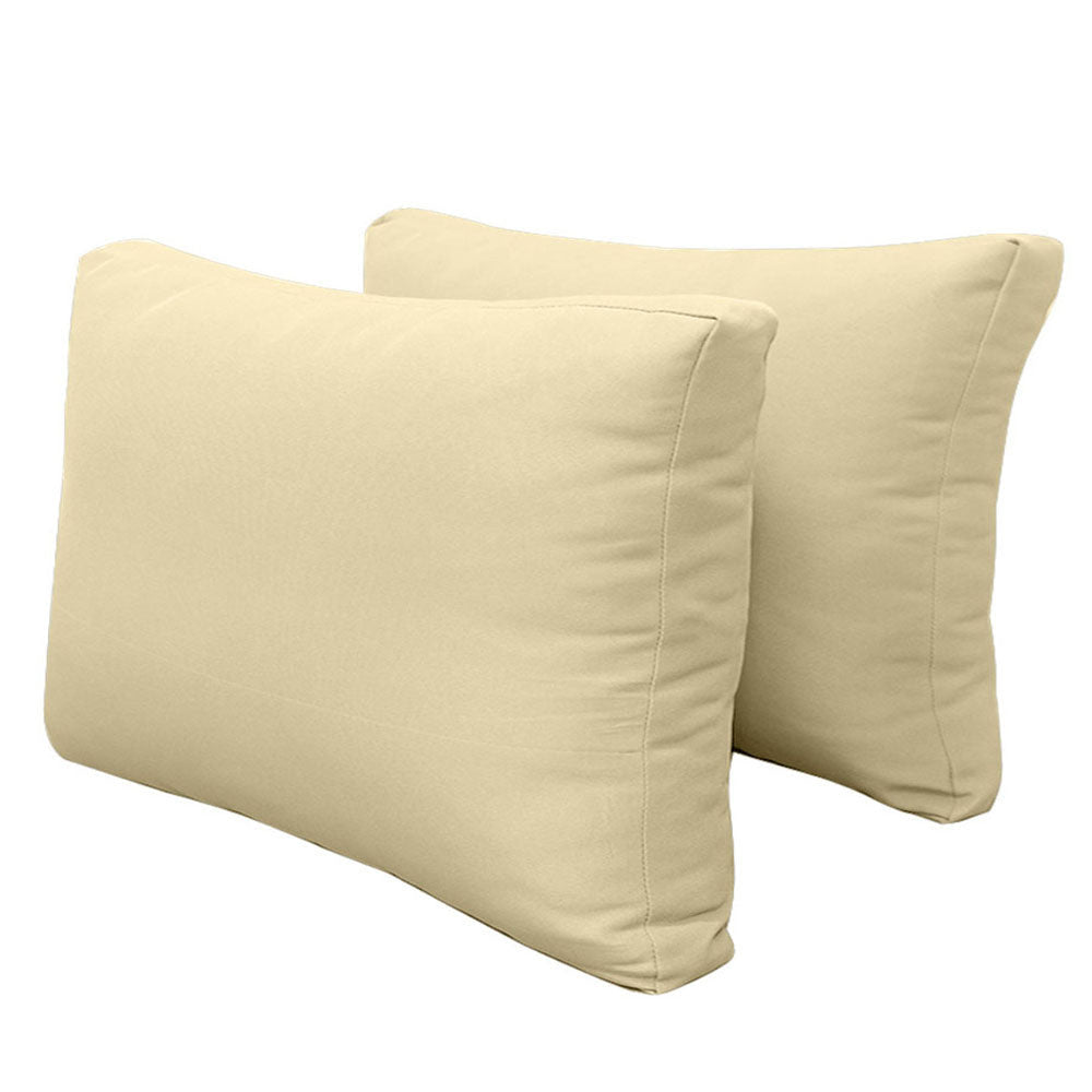 Pillow and bolster cushions displayed on an outdoor porch swing for a cozy, elegant setting