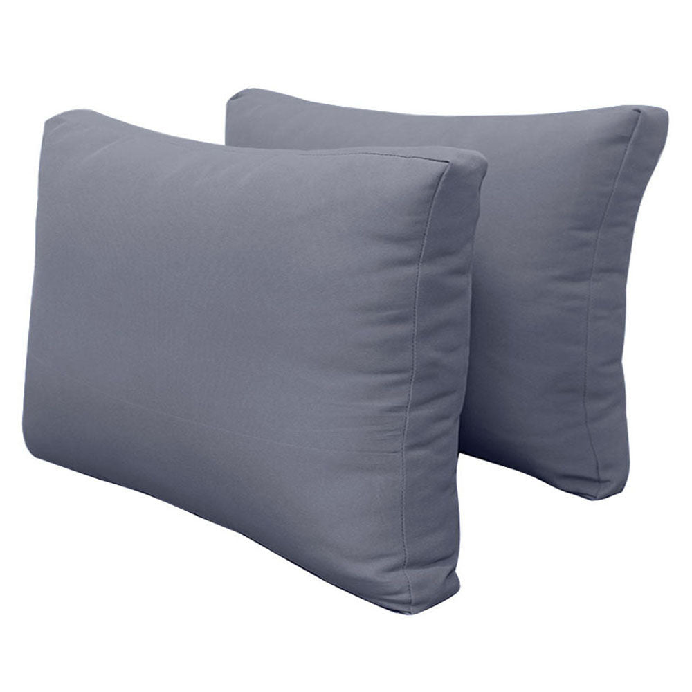 Pillow and bolster cushions displayed on an outdoor porch swing for a cozy, elegant setting