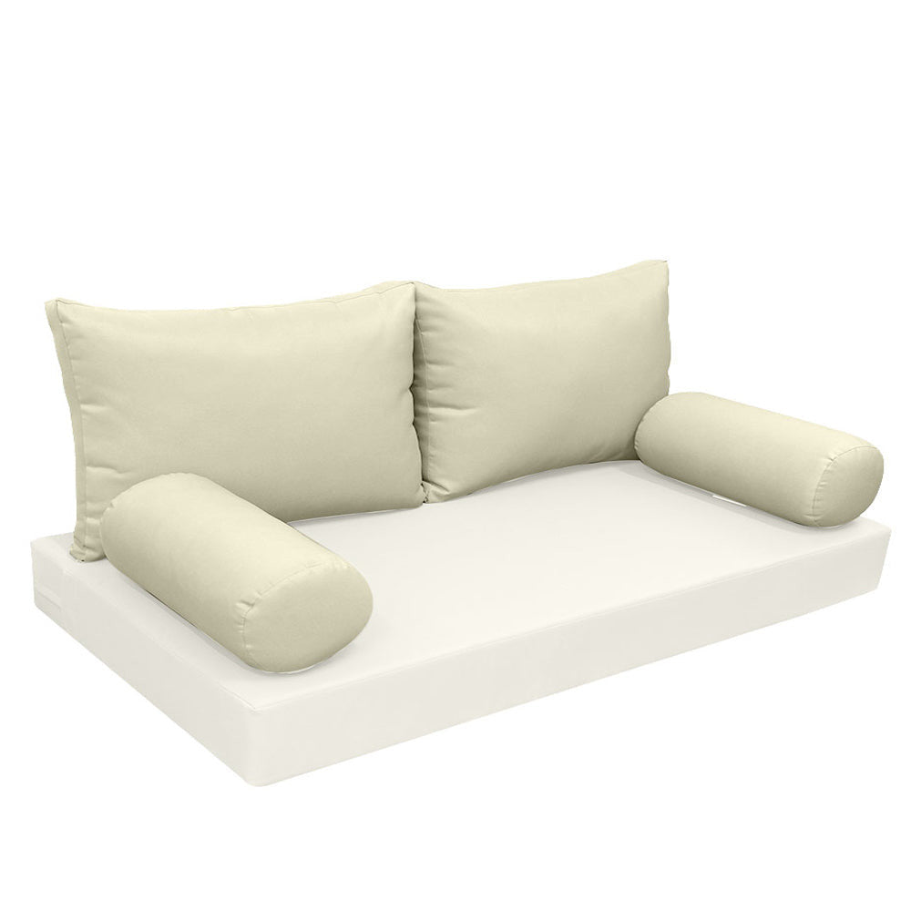 Elegant cushion and bolster set featuring refined craftsmanship and knife-edge detailing, designed for versatile indoor and outdoor comfort
