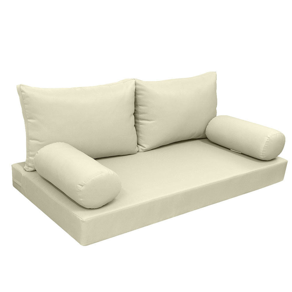 Elegant cushion and bolster set featuring refined craftsmanship and knife-edge detailing, designed for versatile indoor and outdoor comfor