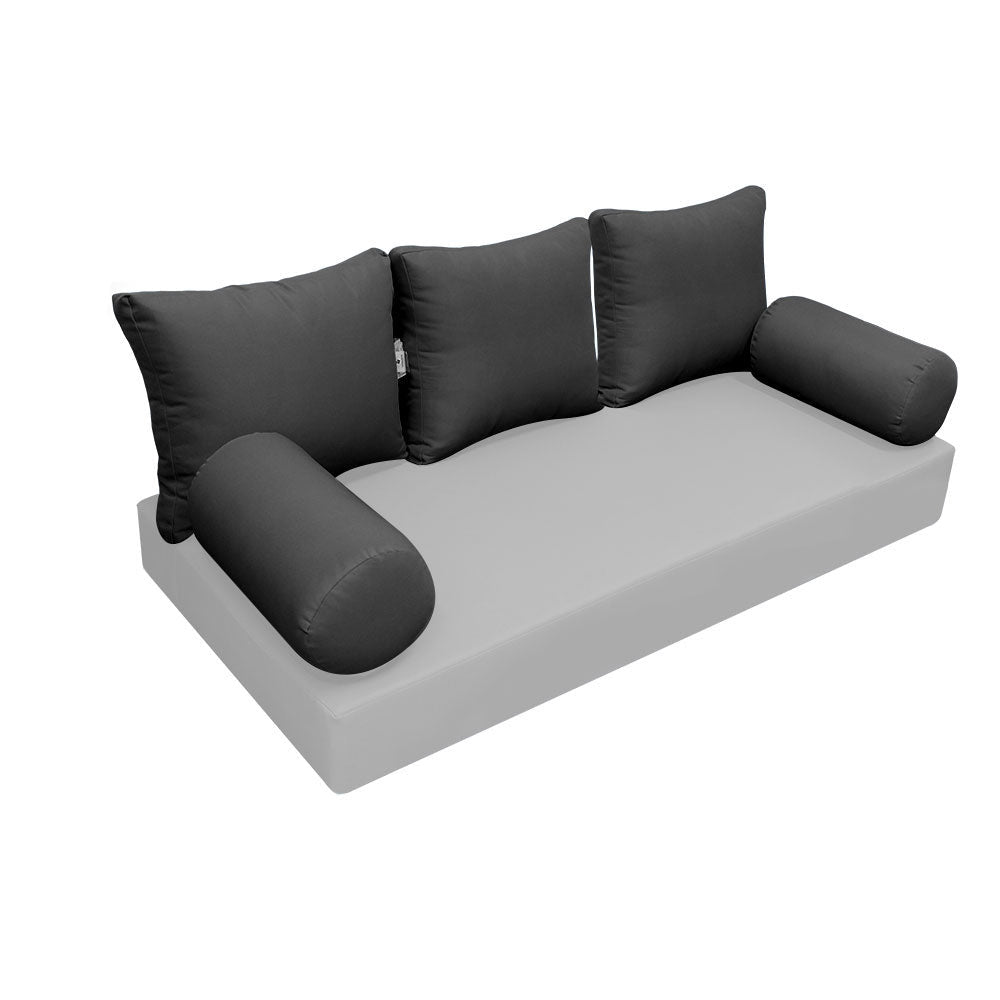Elegant cushion and bolster set featuring refined craftsmanship and knife-edge detailing, designed for versatile indoor and outdoor comfort