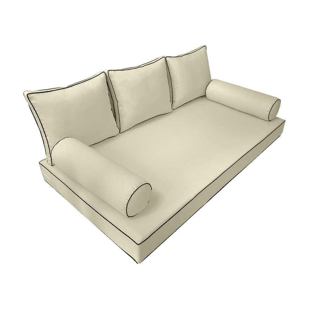Elegant cushion and bolster set featuring refined craftsmanship and knife-edge detailing, designed for versatile indoor and outdoor comfort.