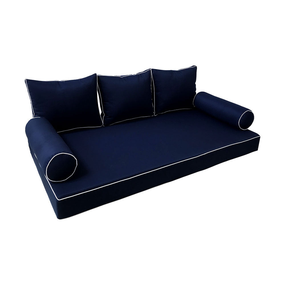 Elegant cushion and bolster set featuring refined craftsmanship and knife-edge detailing, designed for versatile indoor and outdoor comfort.