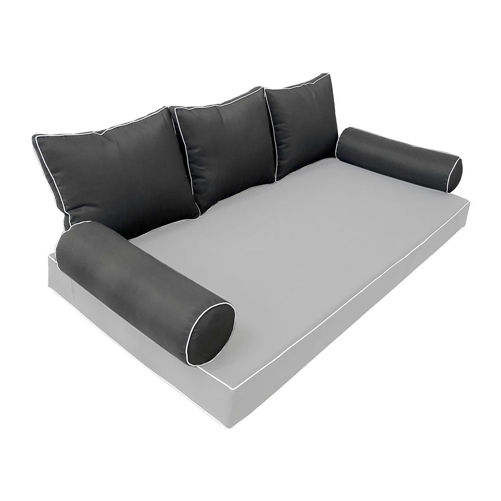 Elegant cushion and bolster set featuring refined craftsmanship and knife-edge detailing, designed for versatile indoor and outdoor comfort.