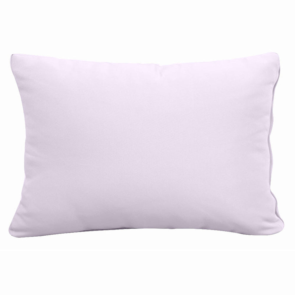 Pillow and bolster cushions displayed on an outdoor porch swing for a cozy, elegant setting
