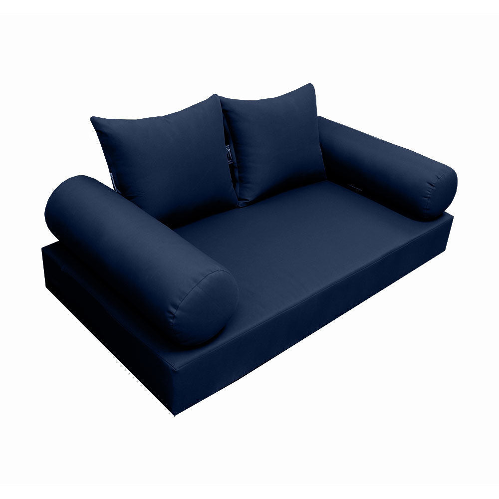 Elegant cushion and bolster set featuring refined craftsmanship and knife-edge detailing, designed for versatile indoor and outdoor comfort.