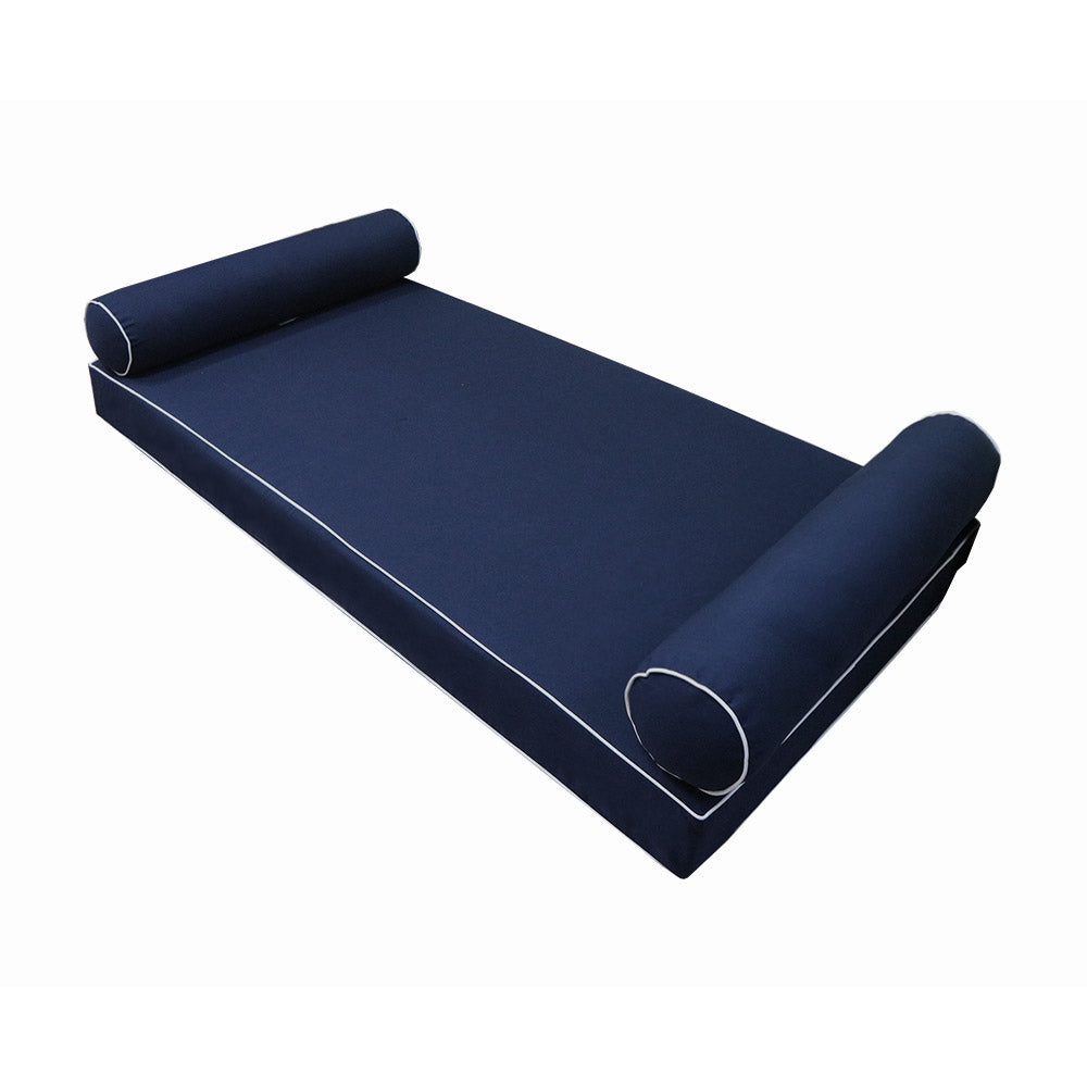 Elegant cushion and bolster set featuring refined craftsmanship and knife-edge detailing, designed for versatile indoor and outdoor comfort.
