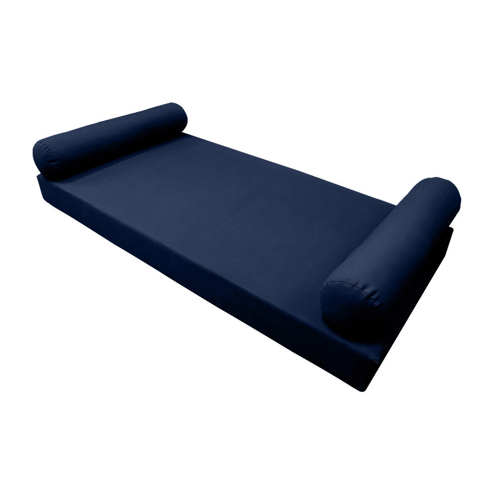 Elegant cushion and bolster set featuring refined craftsmanship and knife-edge detailing, designed for versatile indoor and outdoor comfort.