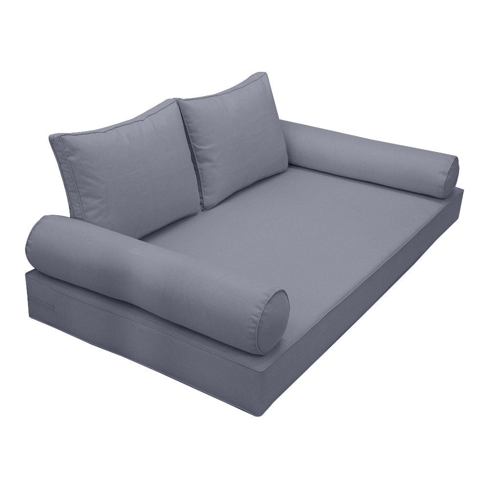 Elegant cushion and bolster set featuring refined craftsmanship and knife-edge detailing, designed for versatile indoor and outdoor comfort.