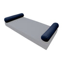 Elegant cushion and bolster set featuring refined craftsmanship and knife-edge detailing, designed for versatile indoor and outdoor comfort.