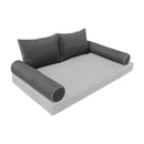 Elegant cushion and bolster set featuring refined craftsmanship and knife-edge detailing, designed for versatile indoor and outdoor comfort.