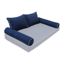 Elegant cushion and bolster set featuring refined craftsmanship and knife-edge detailing, designed for versatile indoor and outdoor comfort.