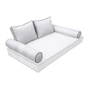 Elegant cushion and bolster set featuring refined craftsmanship and knife-edge detailing, designed for versatile indoor and outdoor comfort.