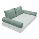 Elegant cushion and bolster set featuring refined craftsmanship and knife-edge detailing, designed for versatile indoor and outdoor comfort.
