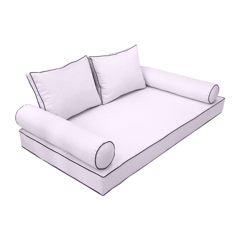 Elegant cushion and bolster set featuring refined craftsmanship and knife-edge detailing, designed for versatile indoor and outdoor comfort.