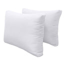 Pillow and bolster cushions displayed on an outdoor porch swing for a cozy, elegant setting