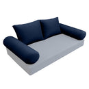Elegant cushion and bolster set featuring refined craftsmanship and knife-edge detailing, designed for versatile indoor and outdoor comfort
