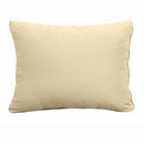 Pillow and bolster cushions displayed on an outdoor porch swing for a cozy, elegant setting
