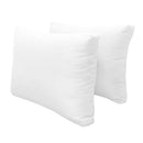 Pillow and bolster cushions displayed on an outdoor porch swing for a cozy, elegant setting