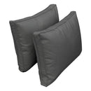 Pillow and bolster cushions displayed on an outdoor porch swing for a cozy, elegant setting.
