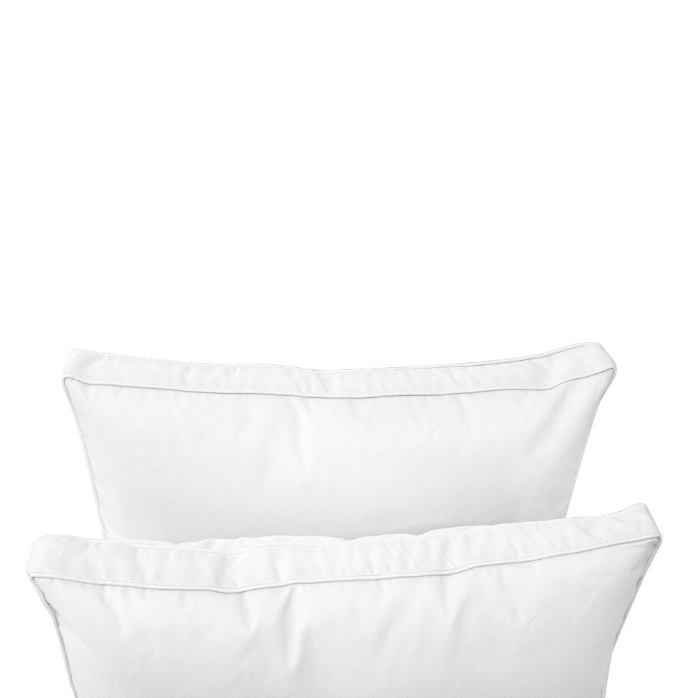 Outdoor daybed styled with cushion set, ideal for patio or garden lounging.
