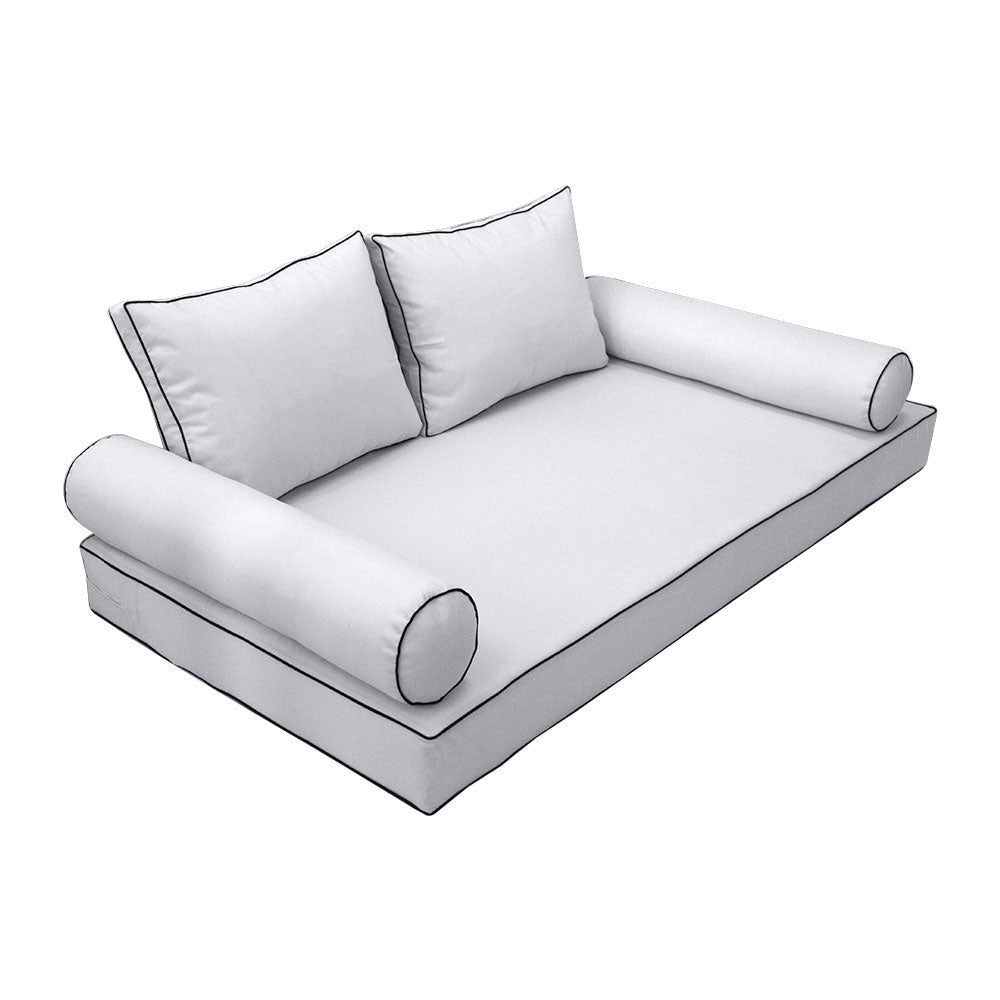 Elegant cushion and bolster set featuring refined craftsmanship and knife-edge detailing, designed for versatile indoor and outdoor comfort.