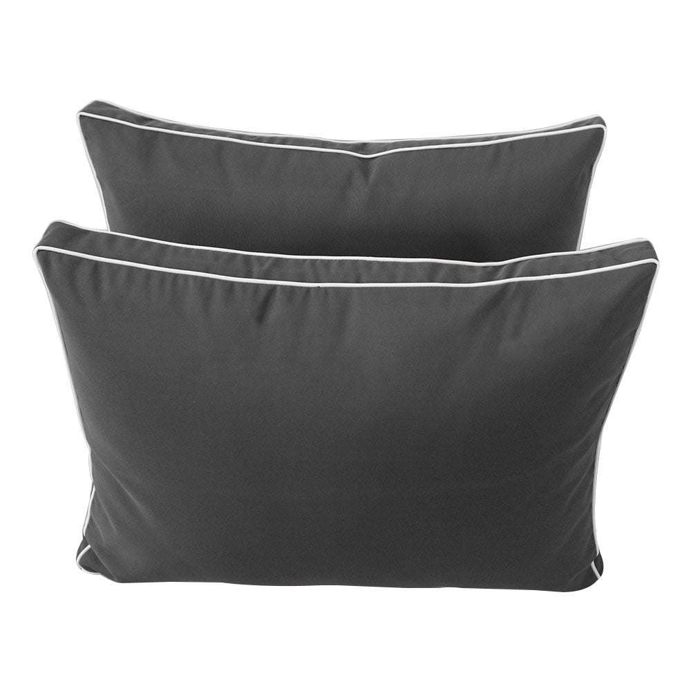 Pillow and bolster cushions displayed on an outdoor porch swing for a cozy, elegant setting.