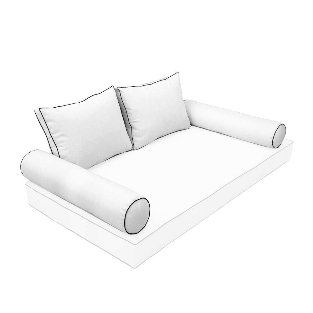 Elegant cushion and bolster set featuring refined craftsmanship and knife-edge detailing, designed for versatile indoor and outdoor comfort.