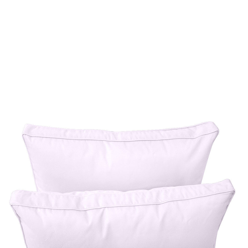 Outdoor daybed styled with cushion set, ideal for patio or garden lounging.
