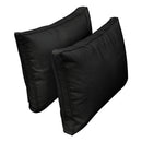 Pillow and bolster cushions displayed on an outdoor porch swing for a cozy, elegant setting.
