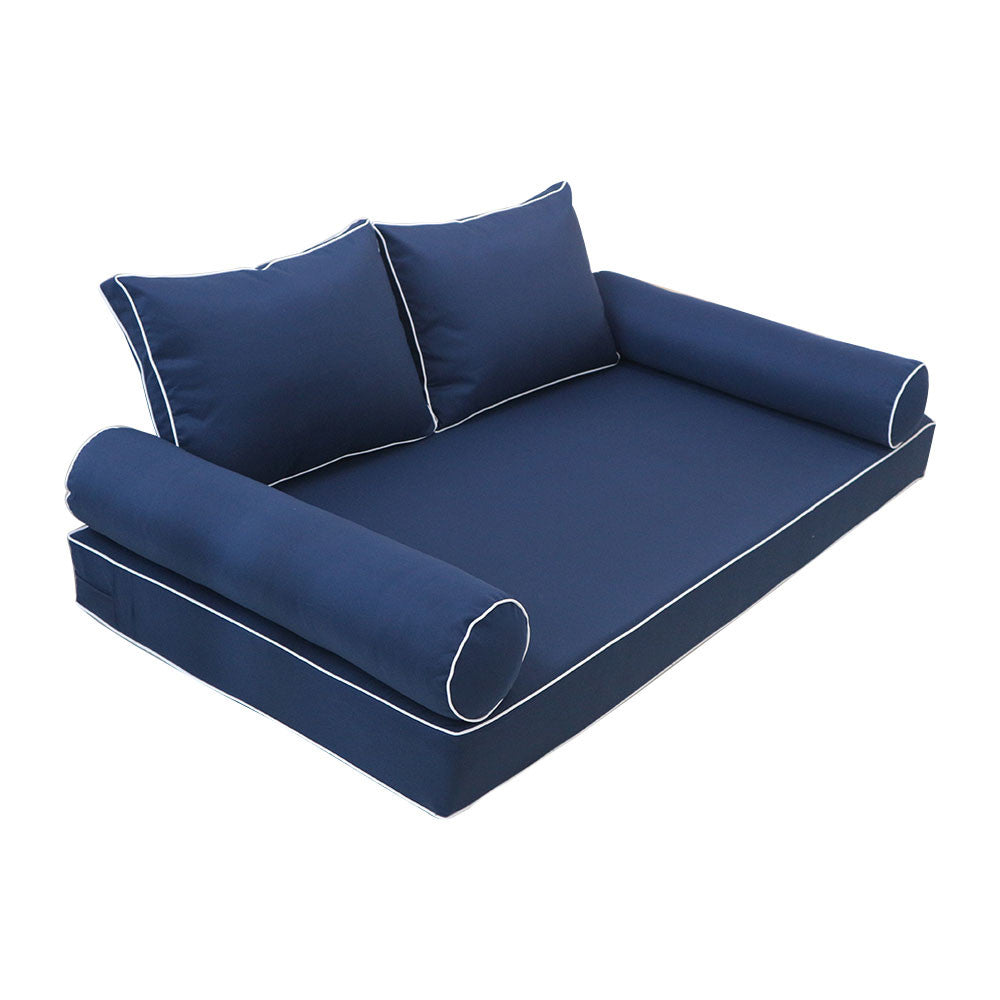 Elegant cushion and bolster set featuring refined craftsmanship and knife-edge detailing, designed for versatile indoor and outdoor comfort.