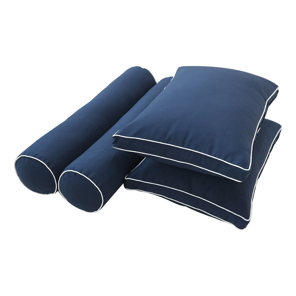 Pillow and bolster cushions displayed on an outdoor porch swing for a cozy, elegant setting.
