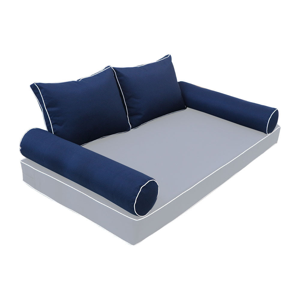 Elegant cushion and bolster set featuring refined craftsmanship and knife-edge detailing, designed for versatile indoor and outdoor comfort.