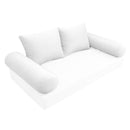 Elegant cushion and bolster set featuring refined craftsmanship and knife-edge detailing, designed for versatile indoor and outdoor comfort