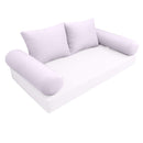 Elegant cushion and bolster set featuring refined craftsmanship and knife-edge detailing, designed for versatile indoor and outdoor comfort