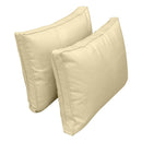 Pillow and bolster cushions displayed on an outdoor porch swing for a cozy, elegant setting.
