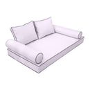 Elegant cushion and bolster set featuring refined craftsmanship and knife-edge detailing, designed for versatile indoor and outdoor comfort.