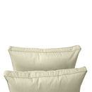 Pillow and bolster cushions displayed on an outdoor porch swing for a cozy, elegant setting.
