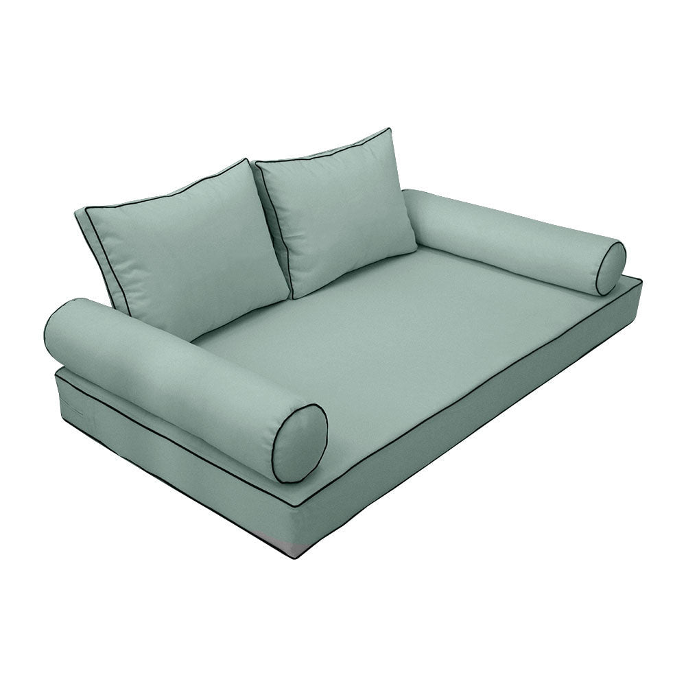 Elegant cushion and bolster set featuring refined craftsmanship and knife-edge detailing, designed for versatile indoor and outdoor comfort.