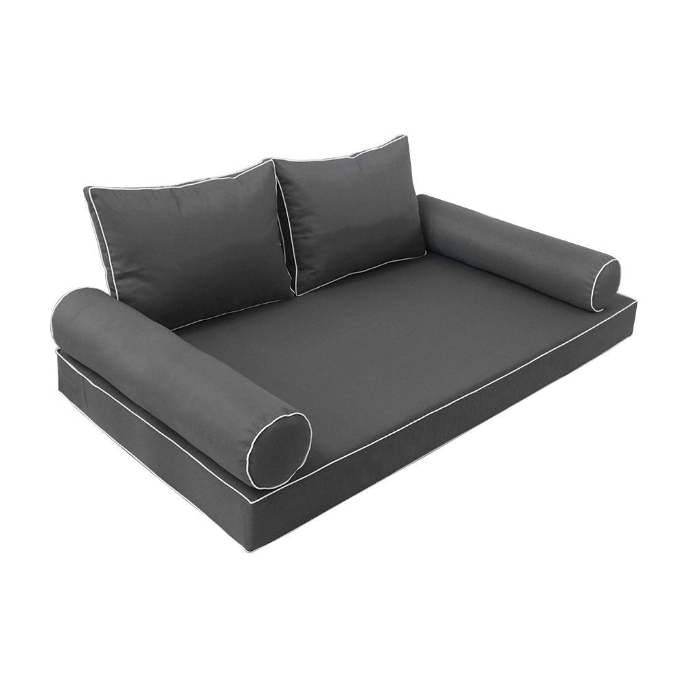 Elegant cushion and bolster set featuring refined craftsmanship and knife-edge detailing, designed for versatile indoor and outdoor comfort.