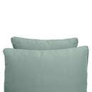 Pillow and bolster cushions displayed on an outdoor porch swing for a cozy, elegant setting