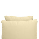 Pillow and bolster cushions displayed on an outdoor porch swing for a cozy, elegant setting
