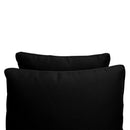 Pillow and bolster cushions displayed on an outdoor porch swing for a cozy, elegant setting